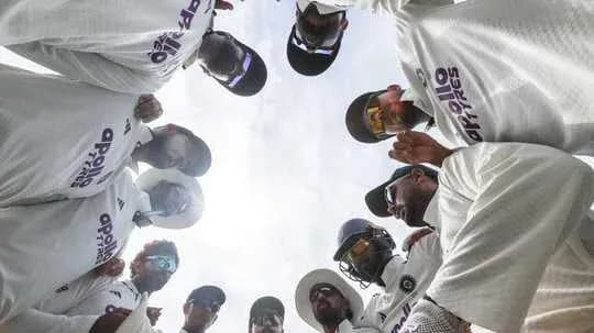 Cricket team huddle before a match