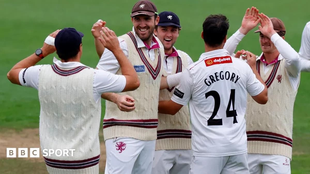 Cricket team celebrating a wicket on the field