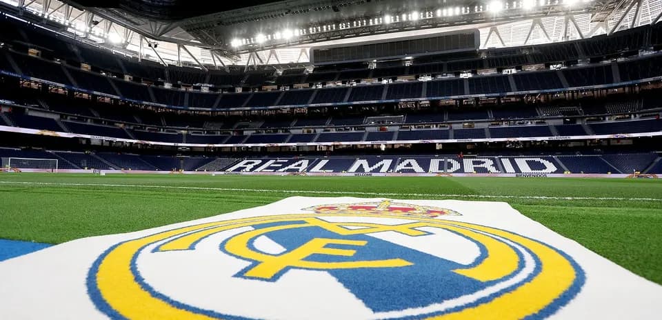 Real Madrid logo on the pitch inside stadium