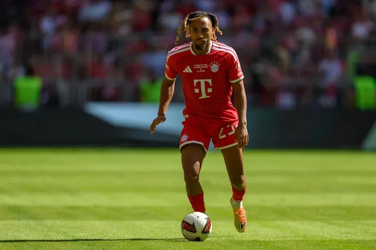 Bayern Munich player dribbling the ball on field