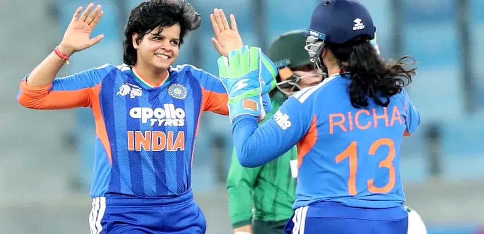 Indian players celebrating a wicket during cricket match