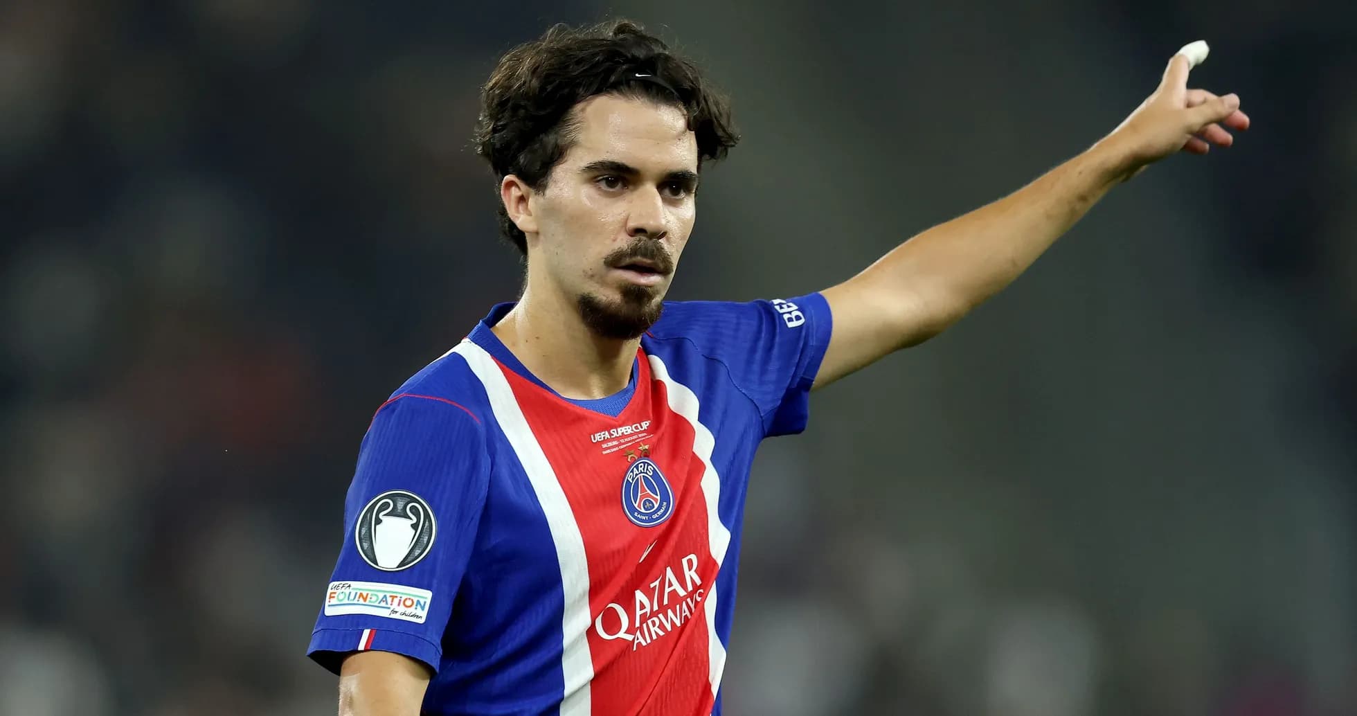 Player gesturing during a UEFA match