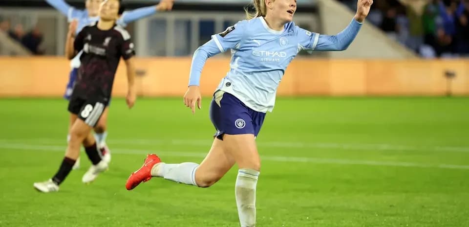 Player celebrating a goal on the field