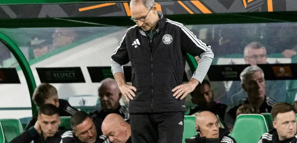 Coach looking down on the sidelines during match