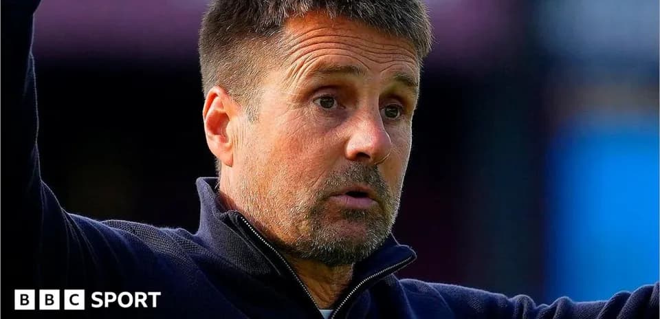 Manager gesturing during a football match