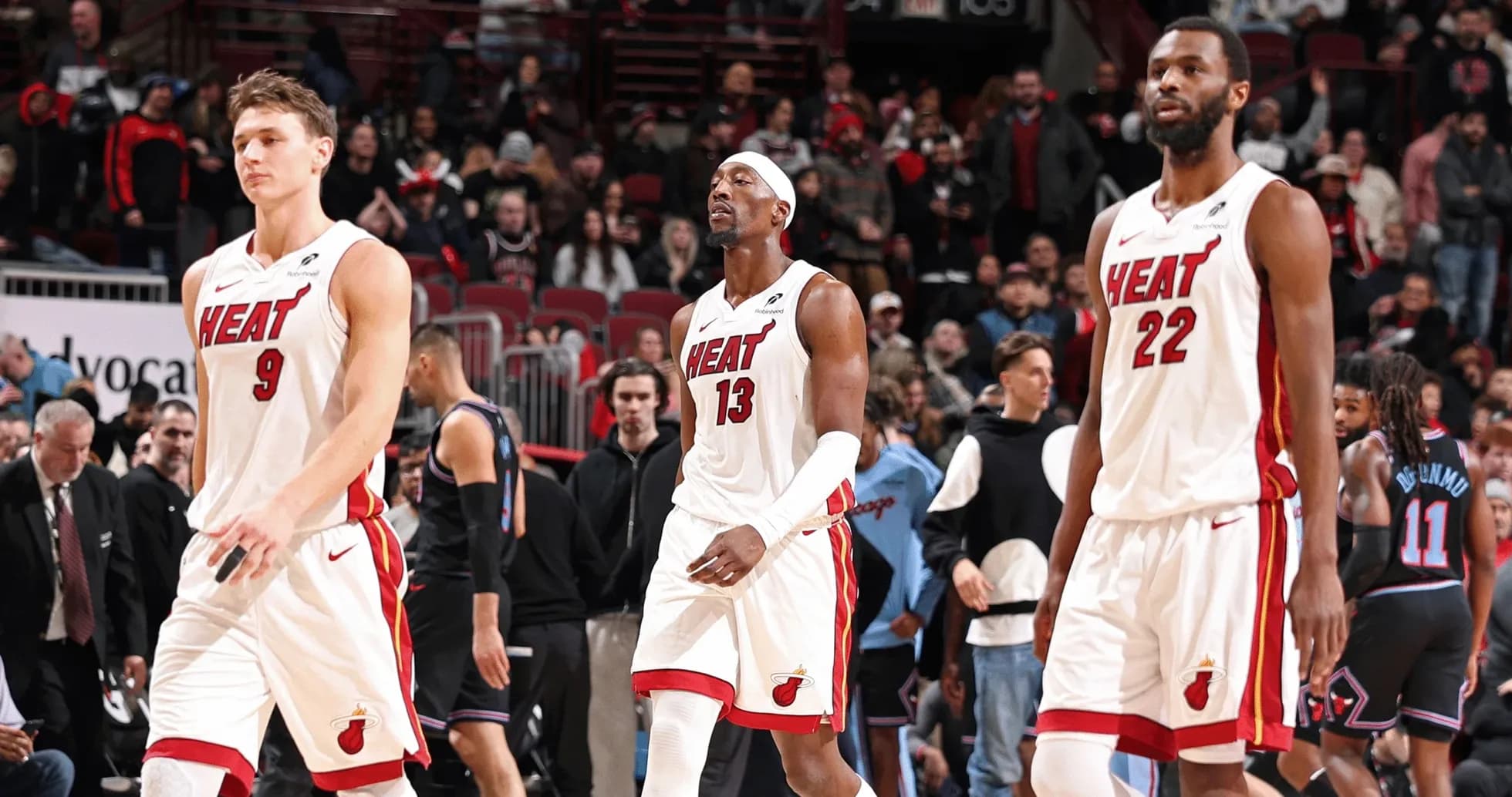 Miami Heat players walking off the court after game