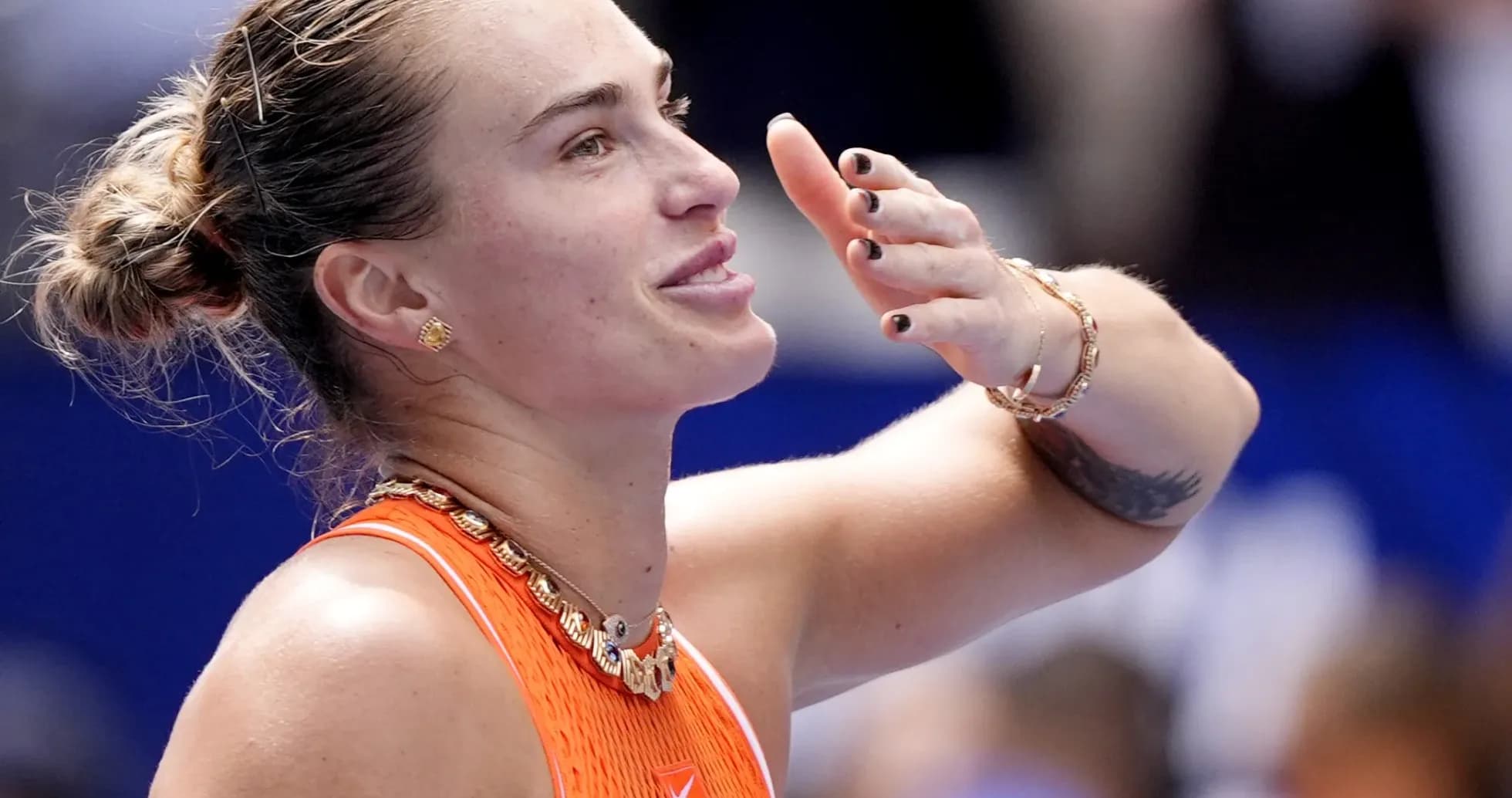 Tennis player celebrating after a victory