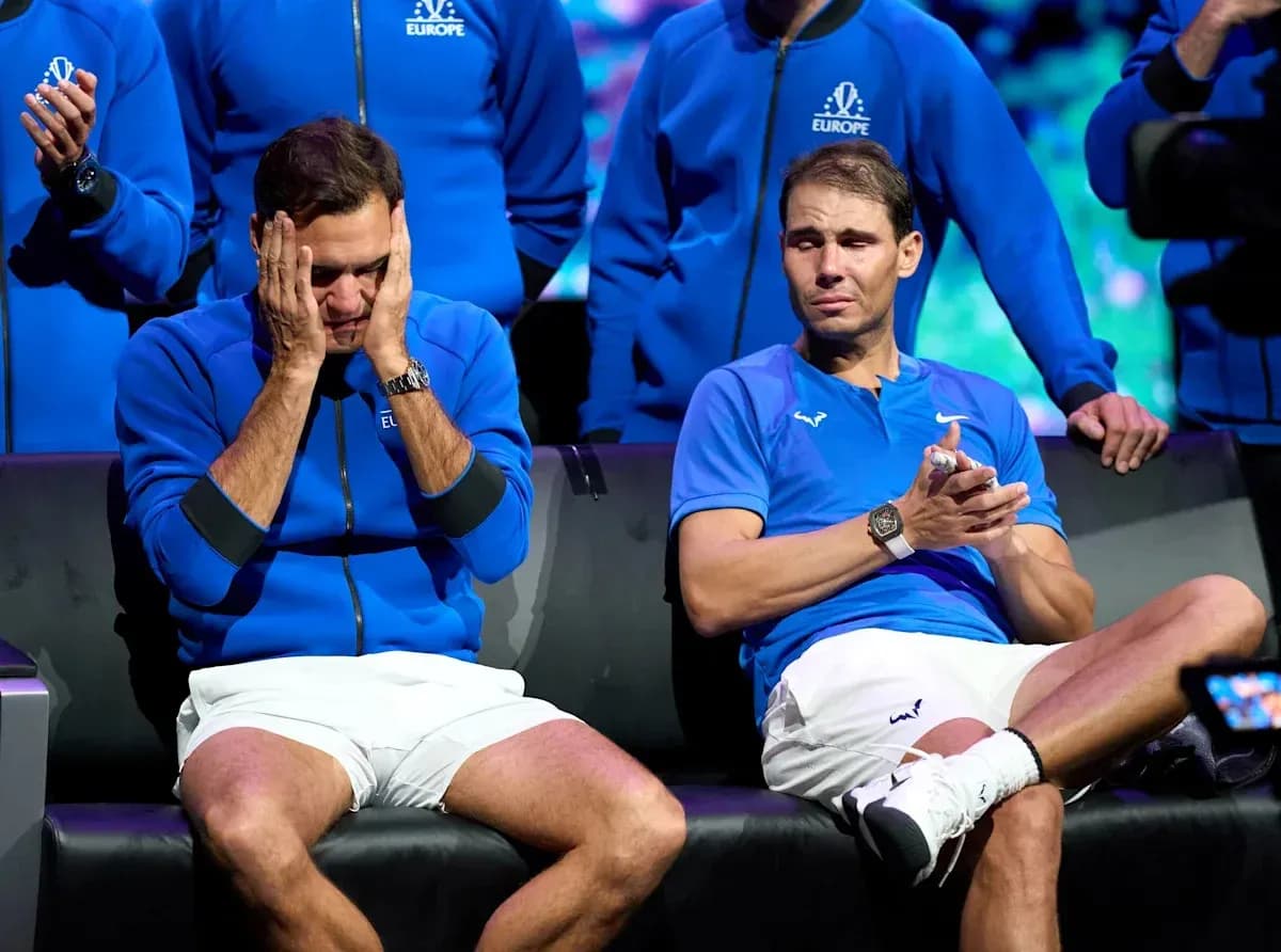 Roger Federer and Rafael Nadal seated during event