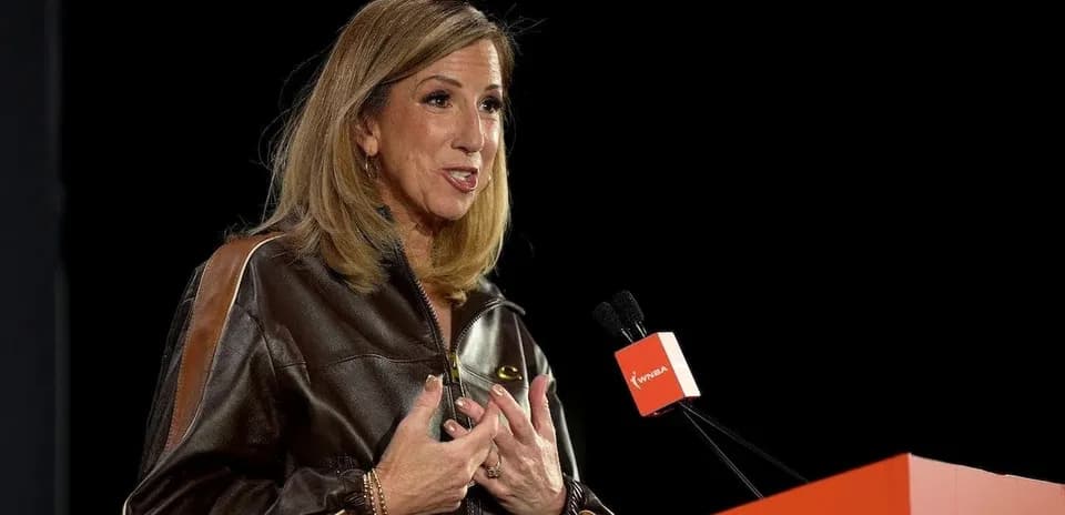 Woman speaking at a podium during event