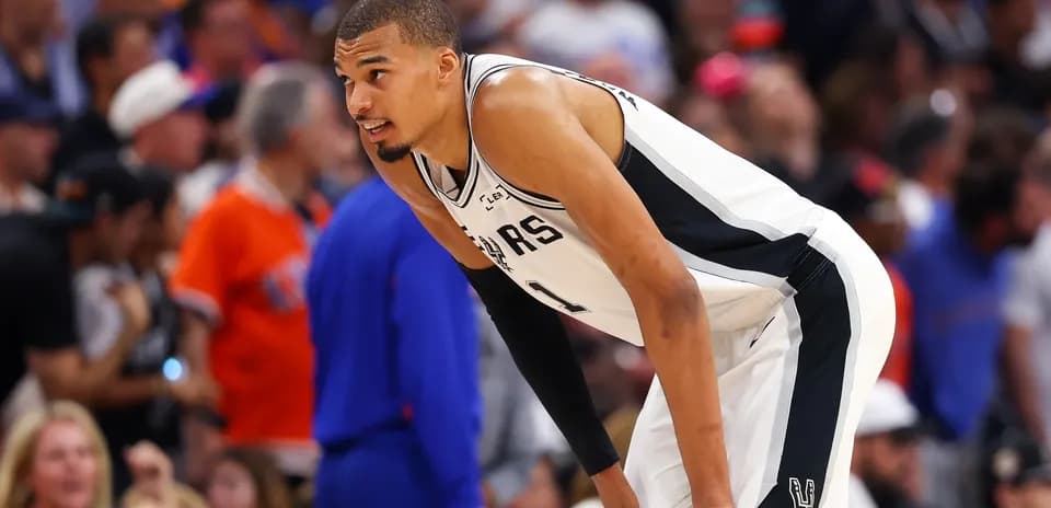 Player in Spurs uniform during intense game moment