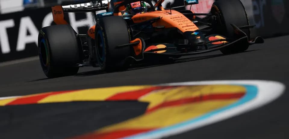 McLaren car racing on track during competition