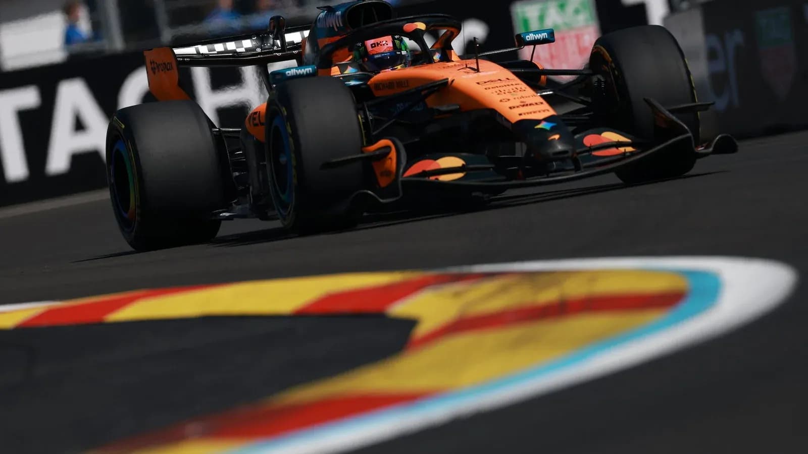 McLaren car racing on track during competition