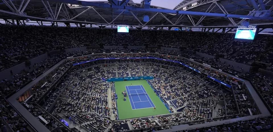 View of stadium filled with spectators during tennis match
