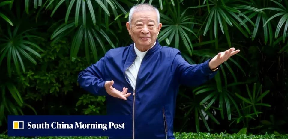 Man performing tai chi in a garden setting