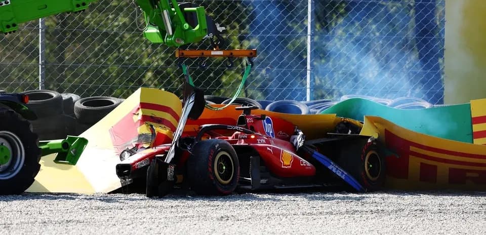 Formula 1 car crashed into barriers with recovery vehicle