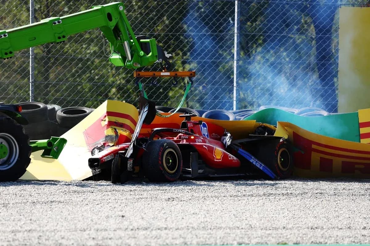 Formula 1 car crashed into barriers with recovery vehicle Formula 1 car crashed into barriers with recovery vehicle