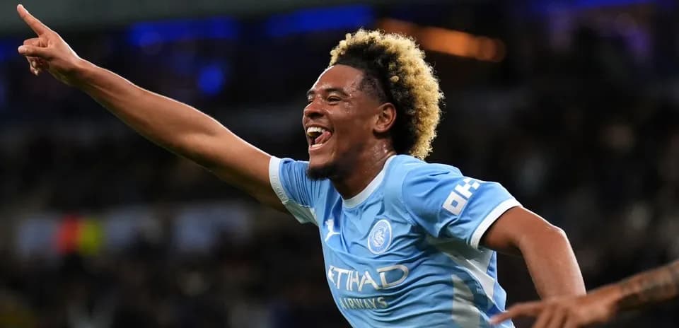Player celebrating goal with raised finger during match