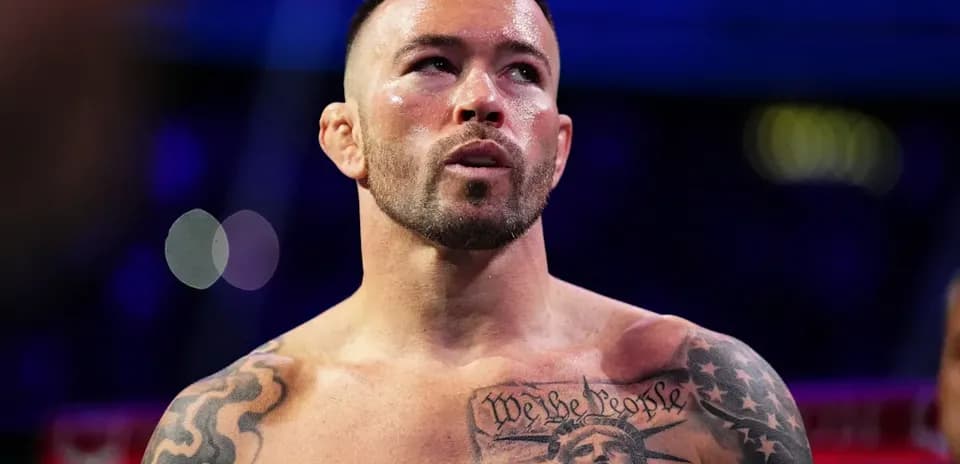 Boxer with tattoos in the ring before match