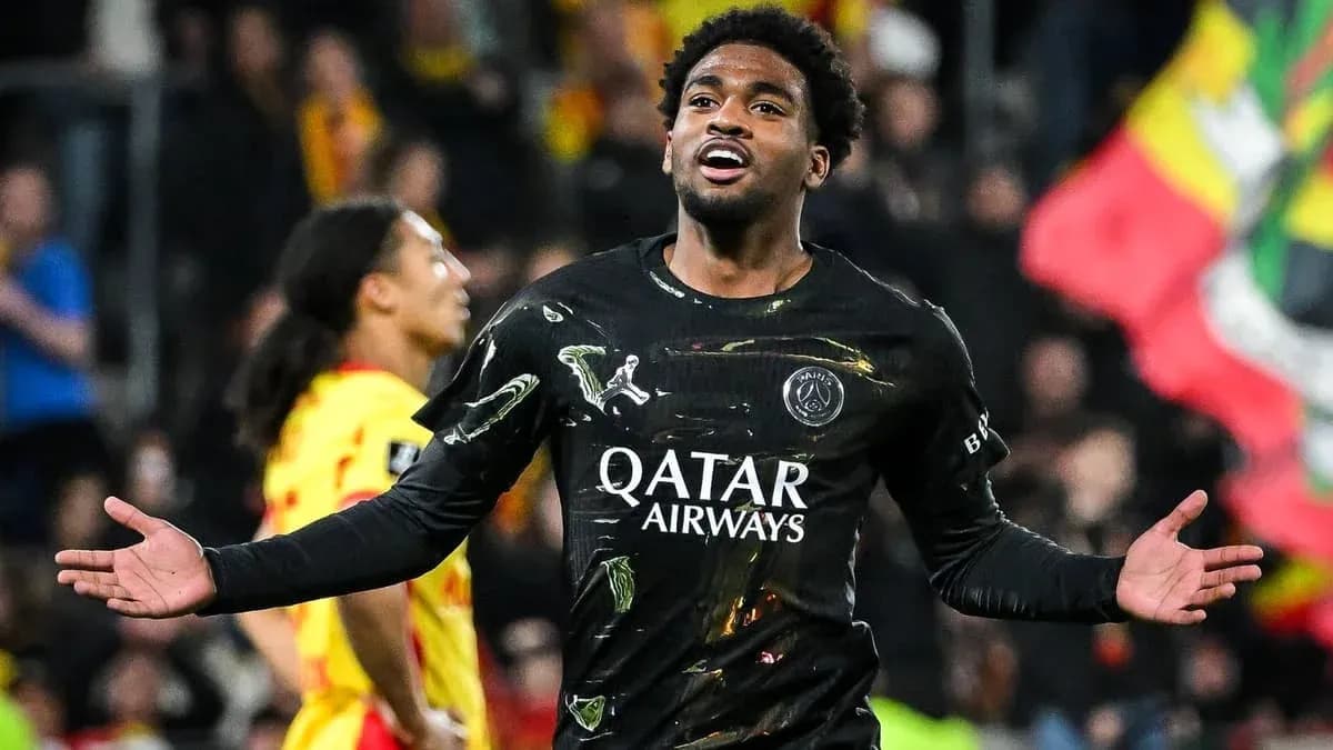 Player celebrating during match wearing PSG jersey
