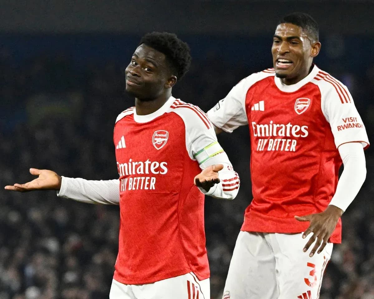 Two Arsenal players celebrating during match