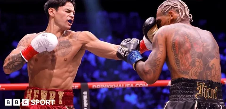Boxers exchanging punches in the ring during match