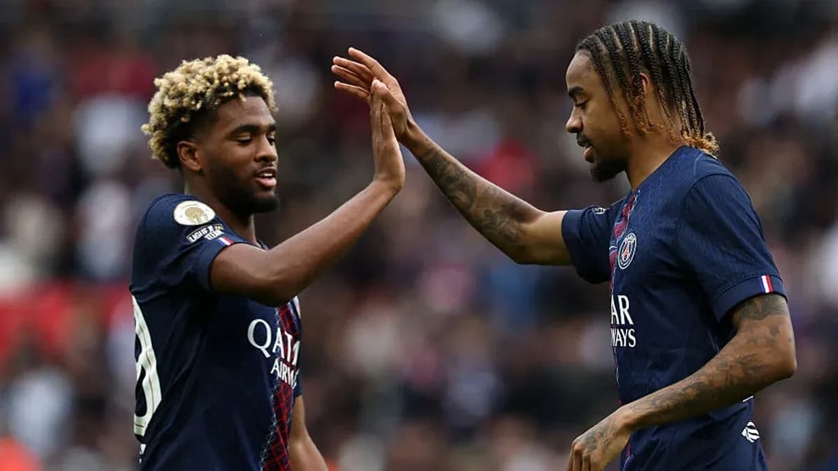 Two Paris Saint-Germain players celebrating a play