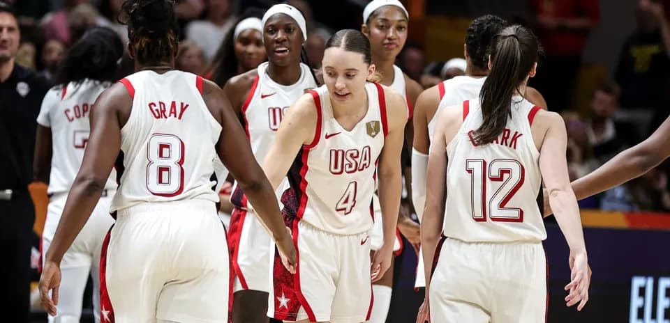 Team USA celebrating during a basketball game