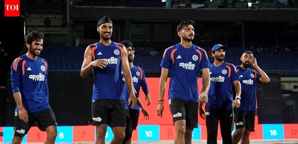 Cricket team players walking off the field after practice