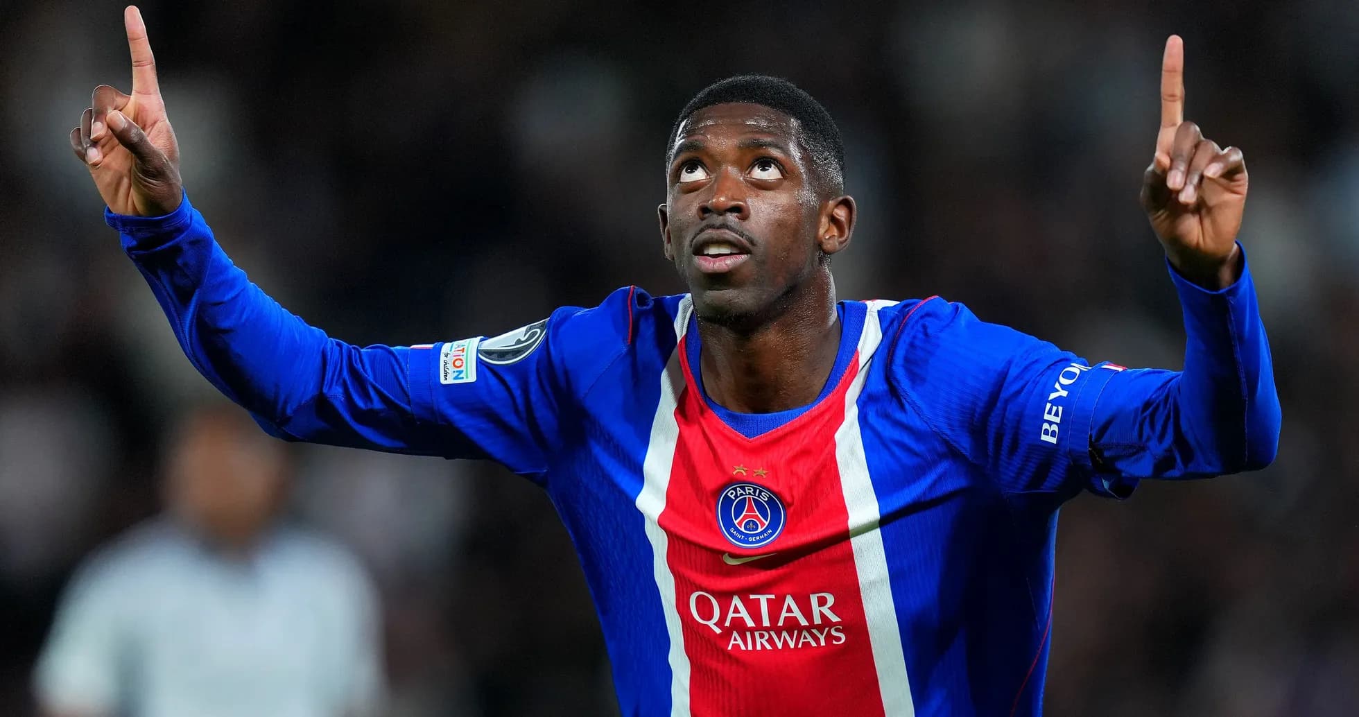 Player celebrating a goal with raised finger