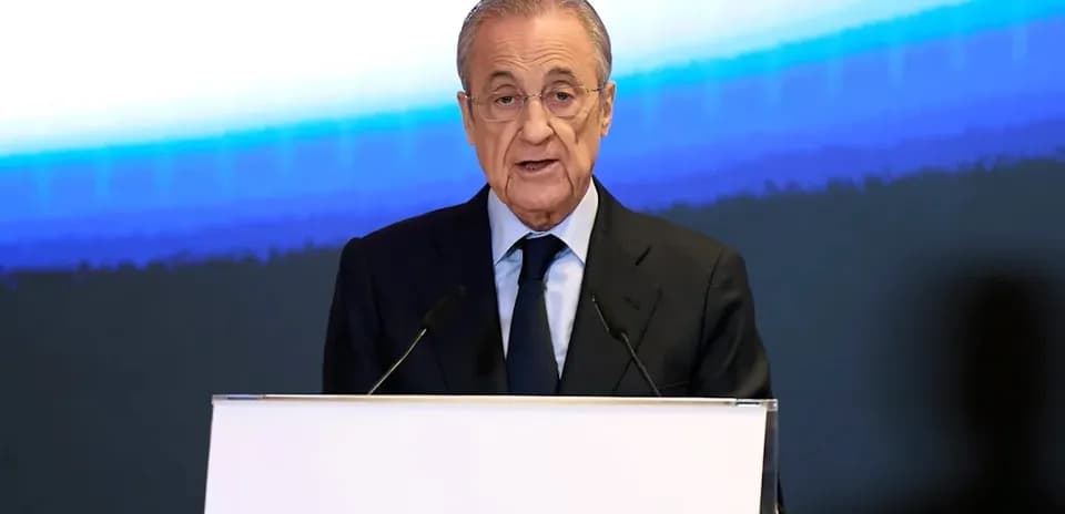 Executive speaking at podium during press conference