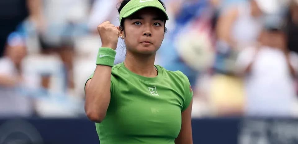 Tennis player celebrating during a match