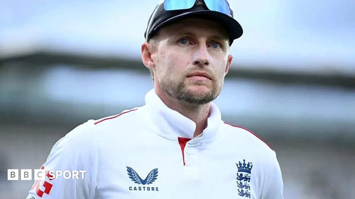 Cricketer in England kit looking focused Cricketer in England kit looking focused