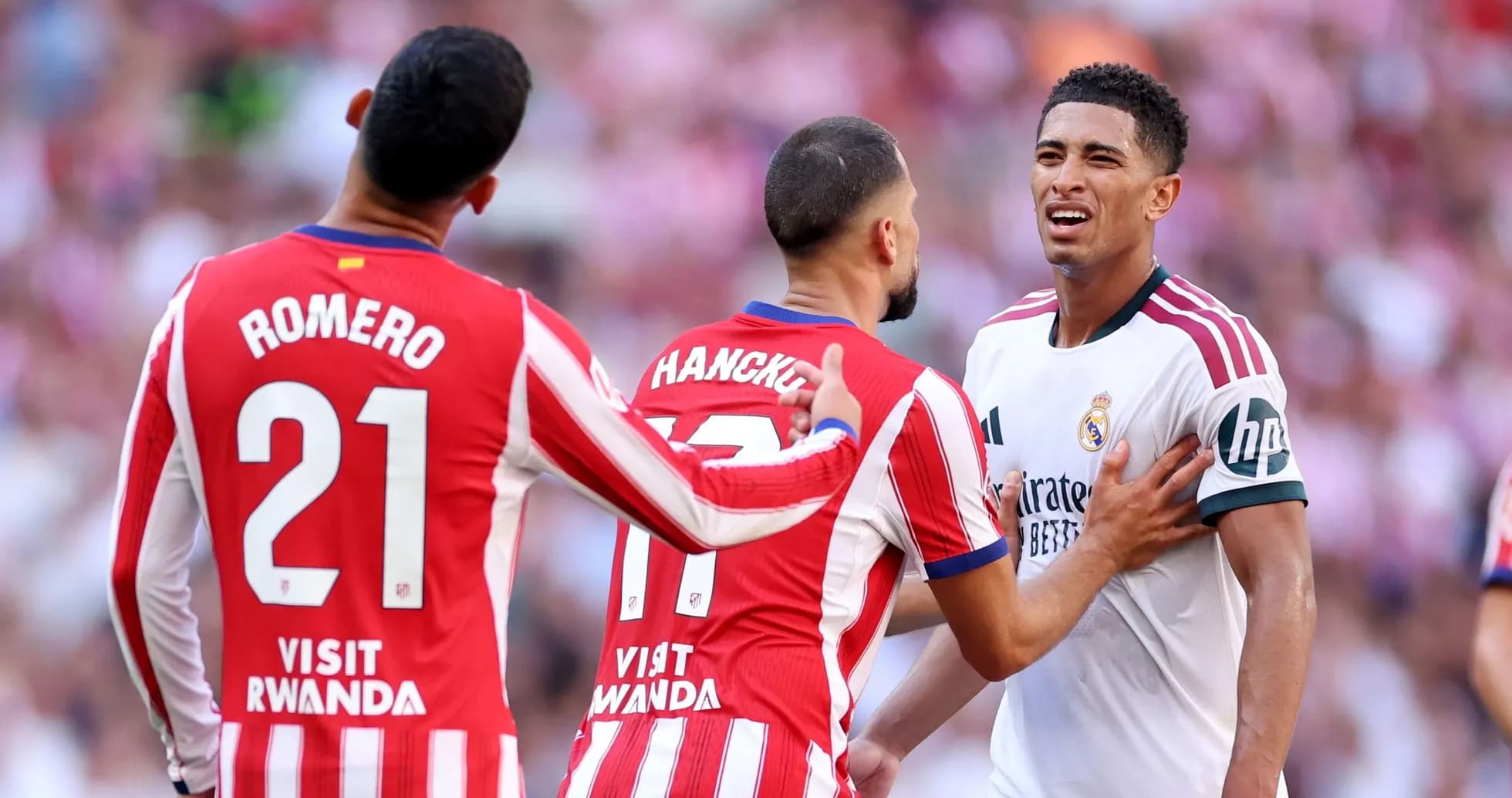 Three players interacting during a heated moment Three players interacting during a heated moment