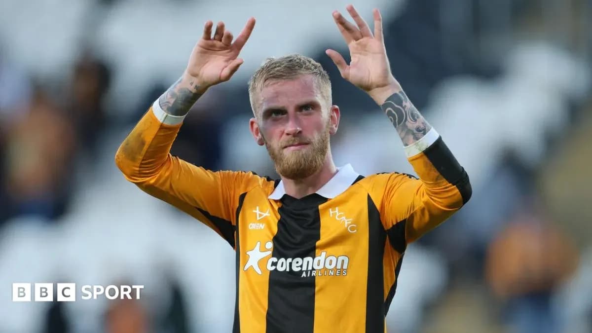 Player acknowledging fans after match in jersey Player acknowledging fans after match in jersey