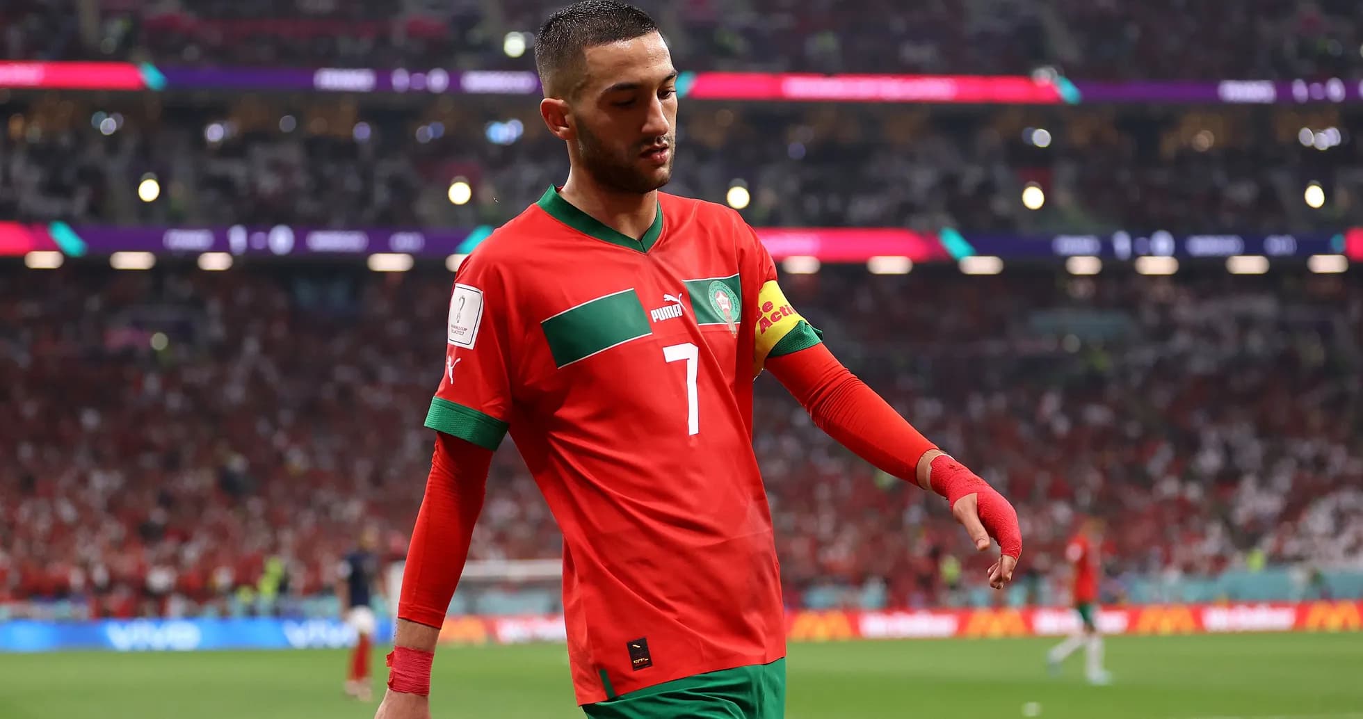 Player walking off the field in Morocco kit Player walking off the field in Morocco kit
