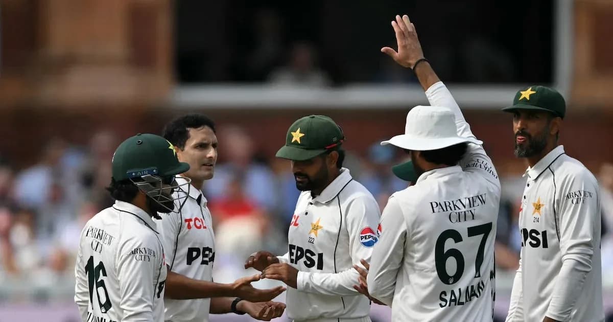 Pakistan cricket team celebrating a wicket on field Pakistan cricket team celebrating a wicket on field
