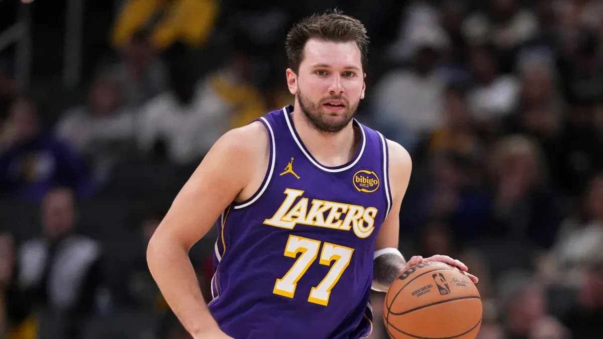 Player dribbling basketball during game for Lakers Player dribbling basketball during game for Lakers