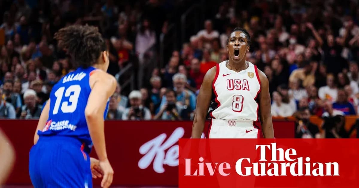 Player in USA jersey celebrating during basketball game Player in USA jersey celebrating during basketball game