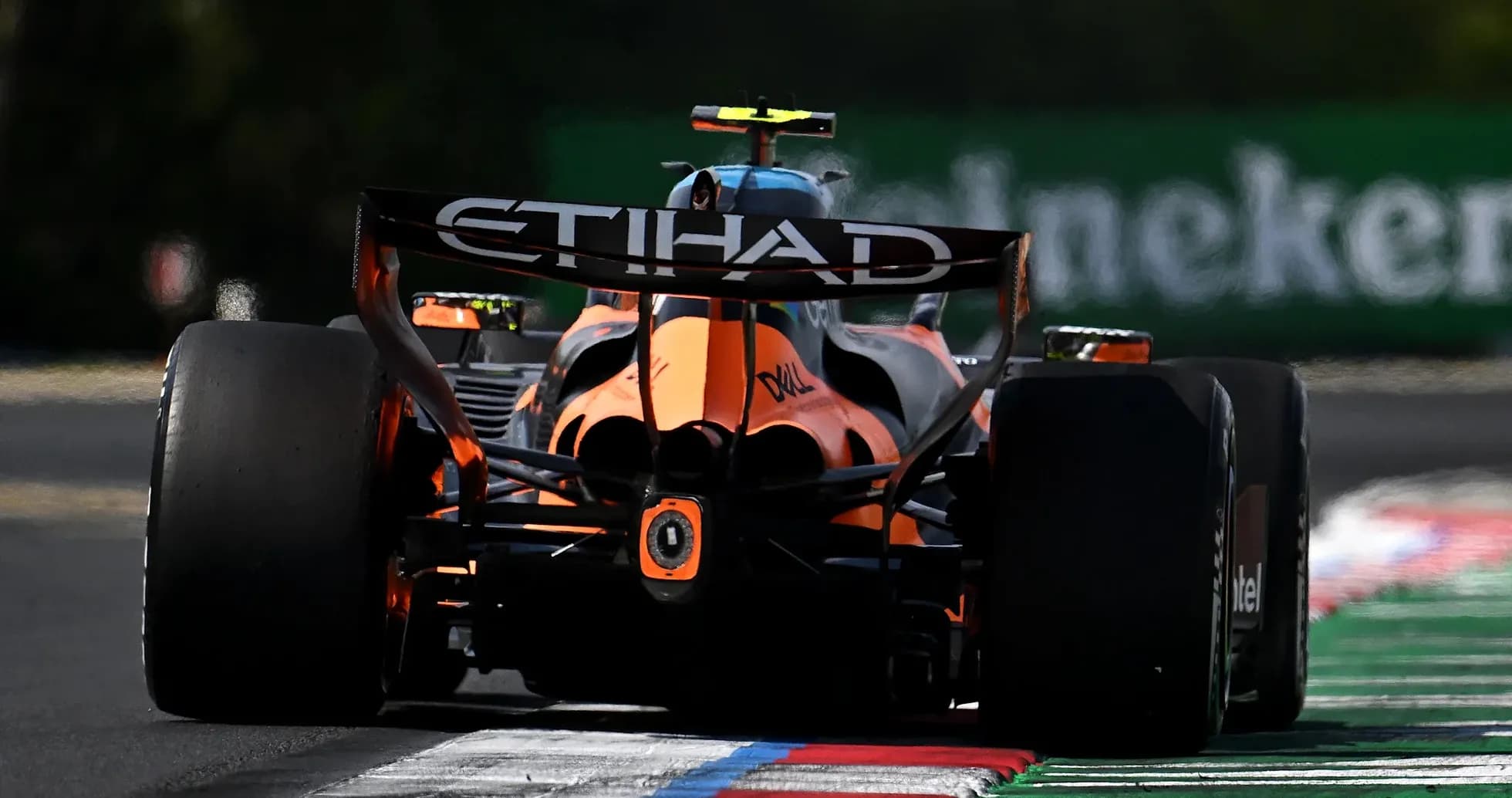 Formula 1 car racing on track during event Formula 1 car racing on track during event