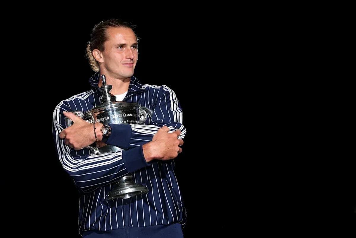 Player holding trophy after winning championship Player holding trophy after winning championship