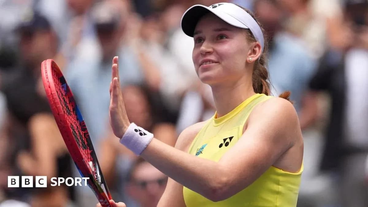 Tennis player waving to crowd after match Tennis player waving to crowd after match