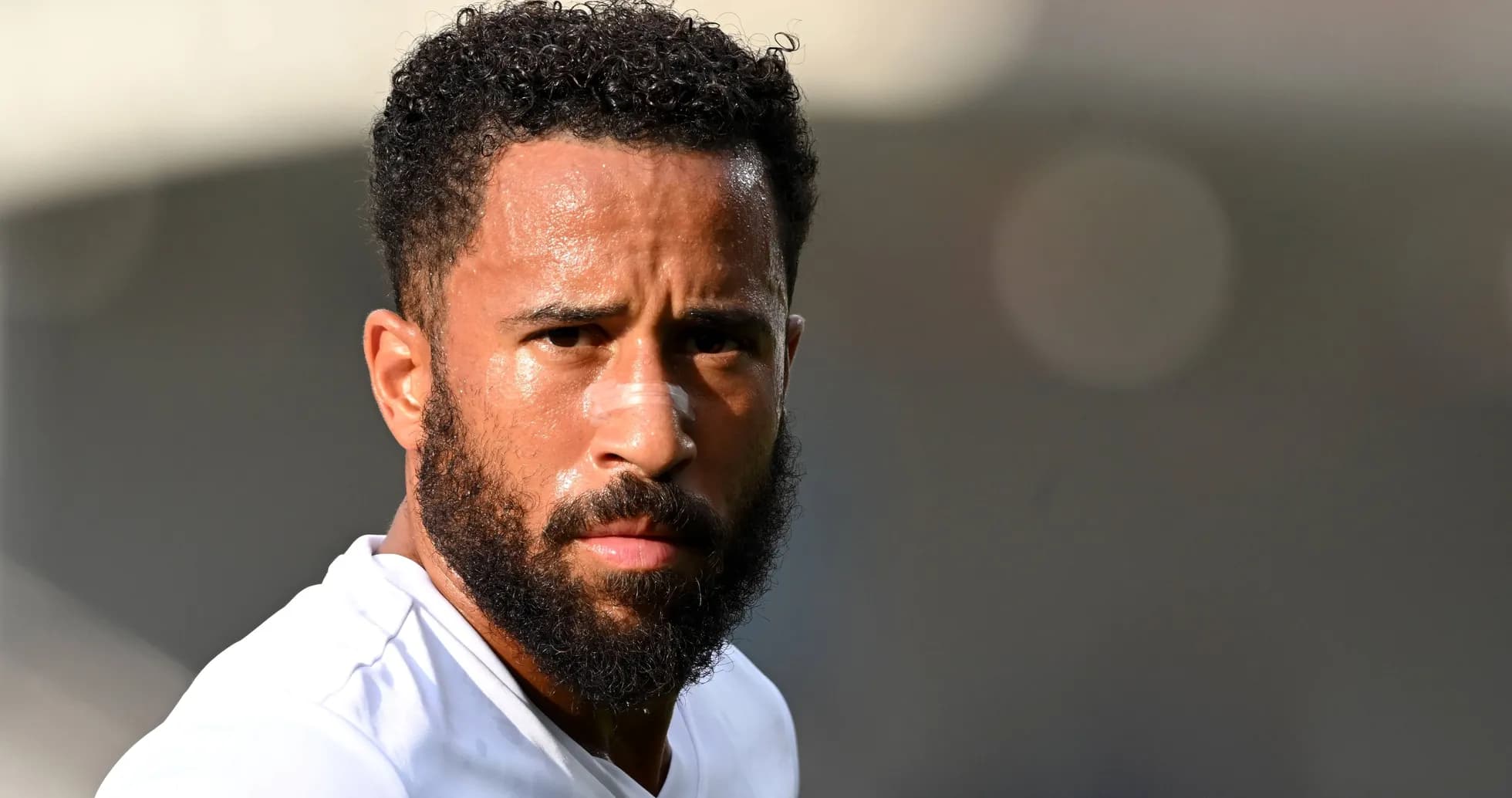 Player with beard and bandage on nose during training Player with beard and bandage on nose during training