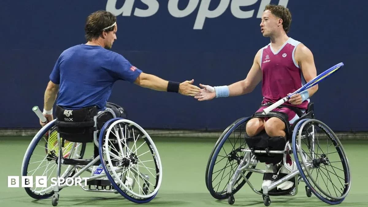 Two wheelchair tennis players shaking hands after match Two wheelchair tennis players shaking hands after match
