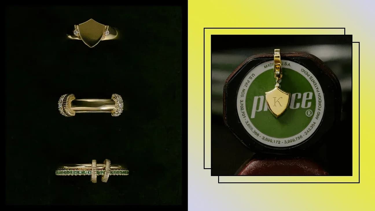 Gold rings and a pendant displayed on a surface Gold rings and a pendant displayed on a surface