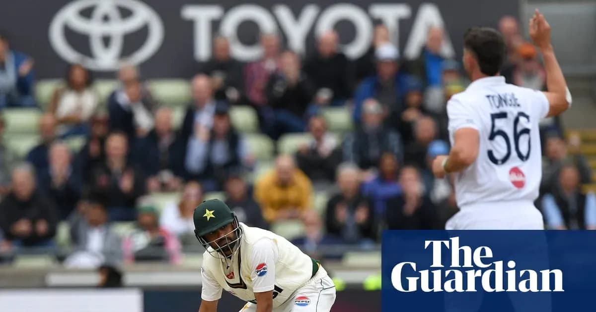 Cricketer from Pakistan playing in front of audience Cricketer from Pakistan playing in front of audience