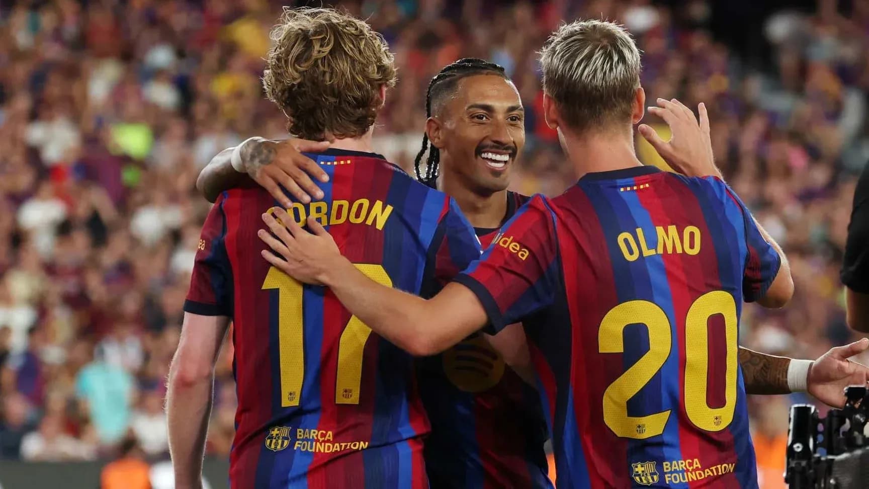 Players celebrating together after scoring a goal Players celebrating together after scoring a goal