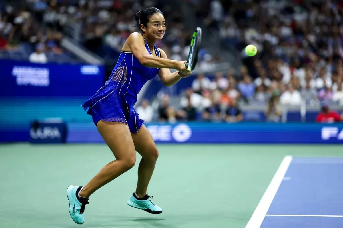 Player hitting a forehand during tennis match Player hitting a forehand during tennis match