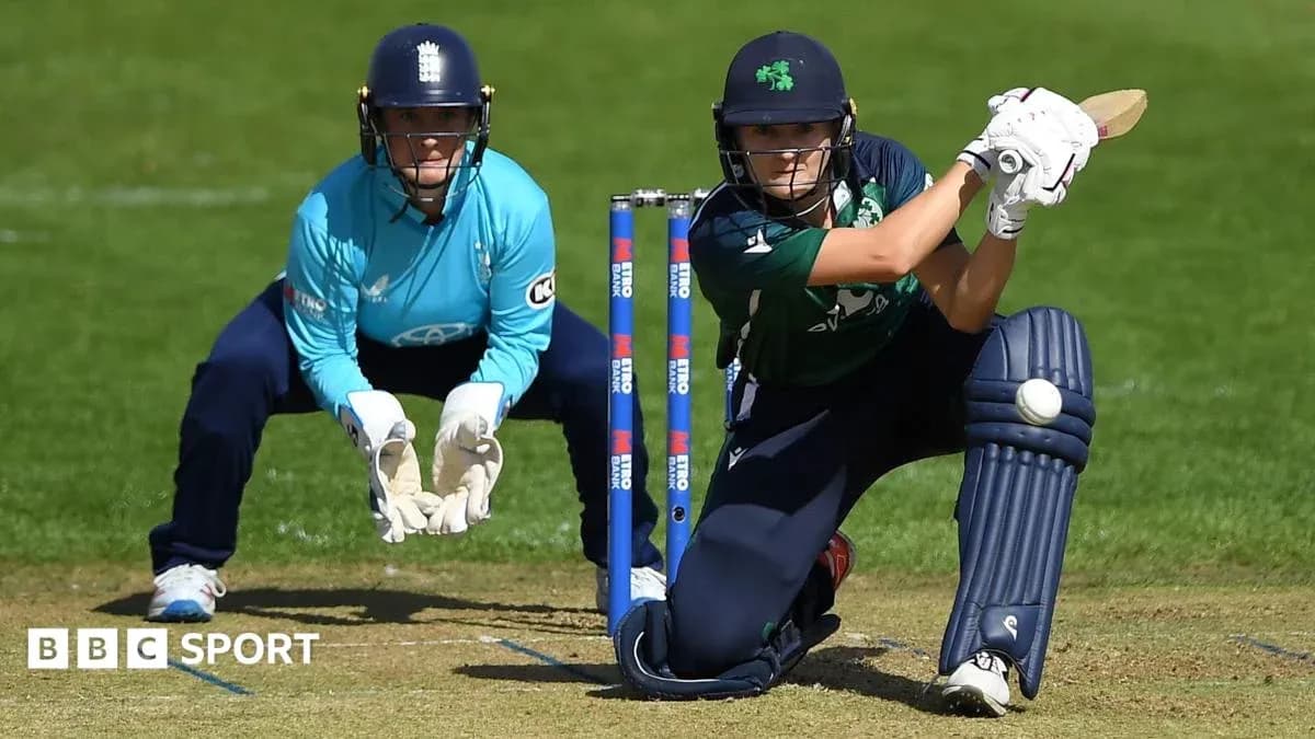 Batter playing a shot with wicketkeeper in position Batter playing a shot with wicketkeeper in position