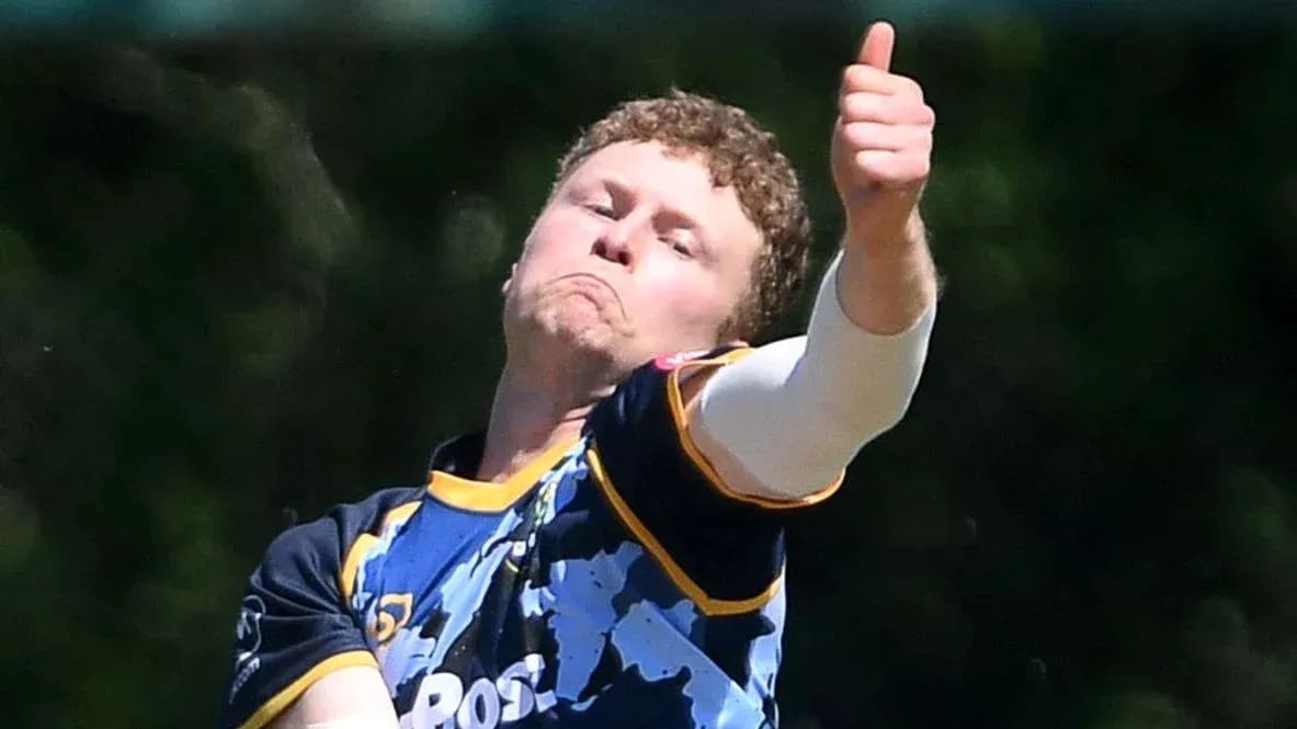 Bowler delivering ball with thumbs up gesture Bowler delivering ball with thumbs up gesture