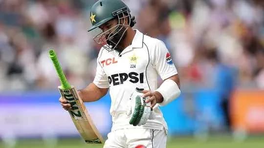 Batter walking off field after dismissal in cricket match Batter walking off field after dismissal in cricket match